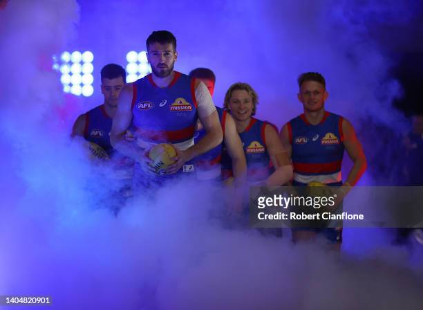 Marcus Bontempelli of the Bulldogs leads the team out during the round 15 AFL match between the Western Bulldogs and the Hawthorn Hawks at Marvel...