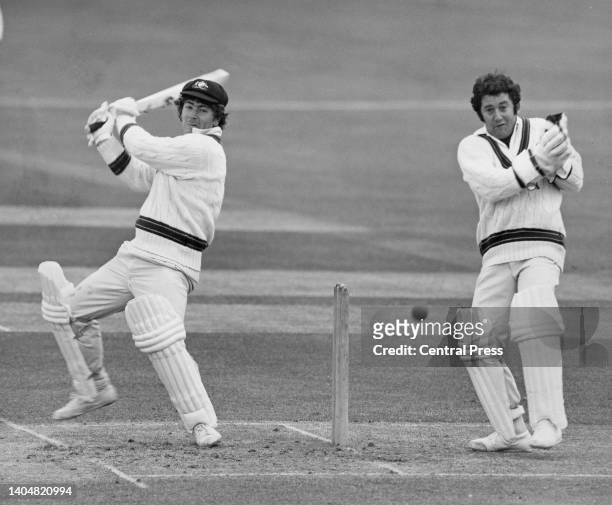 Wicketkeeper Brian Taber looks on from behind the stumps as Rodney Marsh left handed batsman and wicketkeeper for the touring Australian Cricket team...