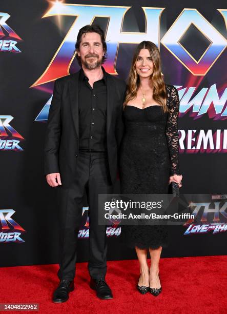 Christian Bale and Sibi Blažić attend Marvel Studios "Thor: Love and Thunder" Los Angeles Premiere at El Capitan Theatre on June 23, 2022 in Los...