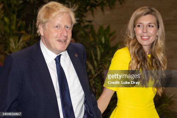 British Prime Minister Boris Johnson and his wife Carrie Johnson arrive for the opening ceremony of the Commonwealth Heads of Government Meeting at...
