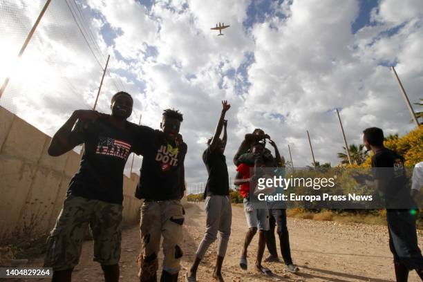 Group of migrants make their way to the Temporary Immigrant Center , as they celebrate the jumping of the Melilla fence, June 24 in Melilla, Spain....