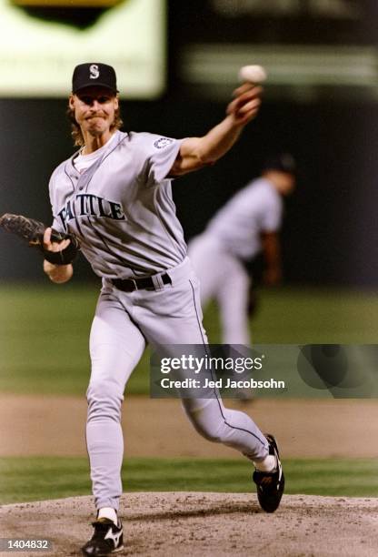 Pitcher Randy Johnson of the Seattle Mariners throws the ball during a game against the Cleveland Indians at Jacobs Field in Cleveland, Ohio. The...