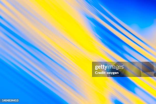 ukraine flag  abstract striped wave yellow blue magical neon  ribbon lines background. - conflict abstract stock pictures, royalty-free photos & images