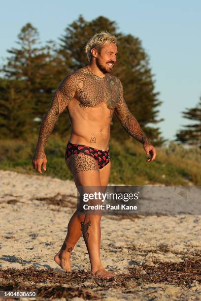 Jack Nowell walks across the beach for a dip during an England Rugby Squad beach recovery session at South Beach on June 24, 2022 in Perth, Australia.