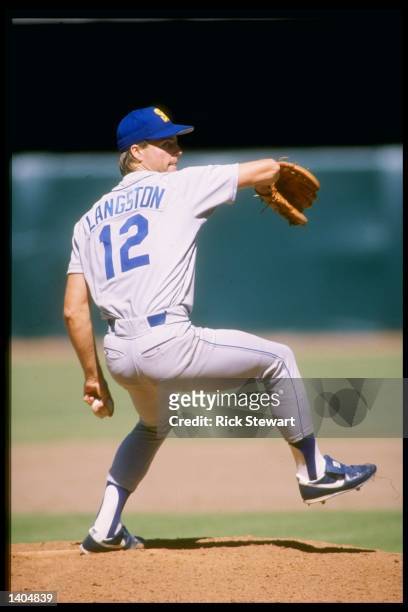 Pitcher Mark Langston of the Seattle Mariners prepares to throw the ball during a game against the California Angels at Anaheim Stadium in Anaheim,...