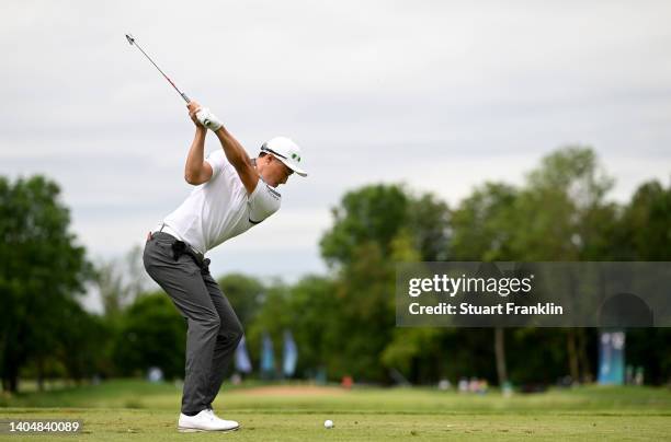 Haotong Li of China on the 12th tee during the second round of the BMW International Open at Golfclub Munchen Eichenried on June 24, 2022 in Munich,...