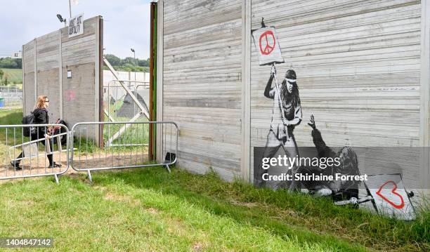 New Banksy artwork, installed on 22nd June is seen during day three of Glastonbury Festival at Worthy Farm, Pilton on June 24, 2022 in Glastonbury,...