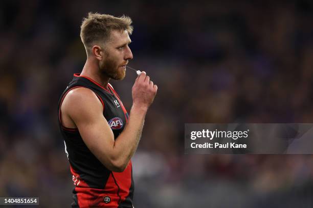 Dyson Heppell of the Bombers looks on during the round 15 AFL match between the West Coast Eagles and the Essendon Bombers at Optus Stadium on June...