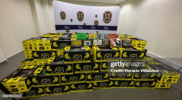 View of impounded banana boxes containing packages of cocaine, part of "Operação Bananero" , on display at the the Judicial Police headquarters on...