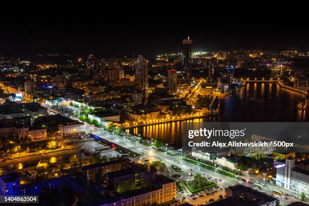 high angle view of illuminated city buildings at night,yekaterinburg,russia - ekaterinburg stock pictures, royalty-free photos & images