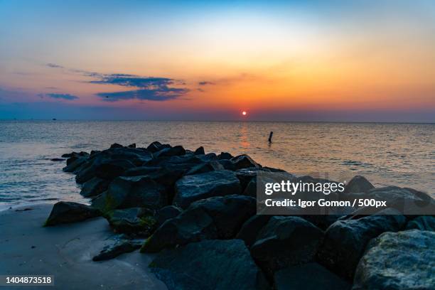 scenic view of sea against sky during sunset,hampton,virginia,united states,usa - hampton virginia stock pictures, royalty-free photos & images