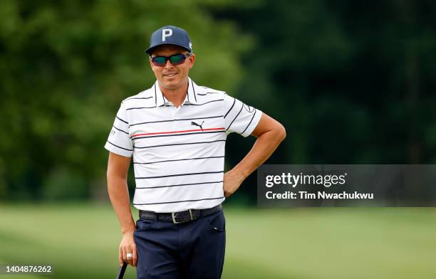 Rickie Fowler of the United States waits to putt on the third green during the second round of Travelers Championship at TPC River Highlands on June...