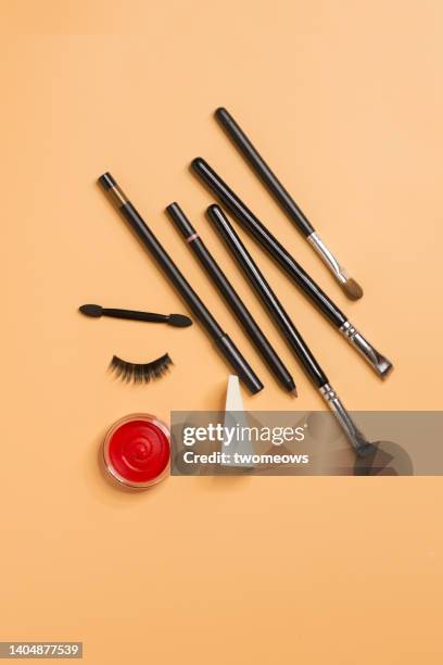 conceptual abstract beauty product still life. - false eyelash stock-fotos und bilder