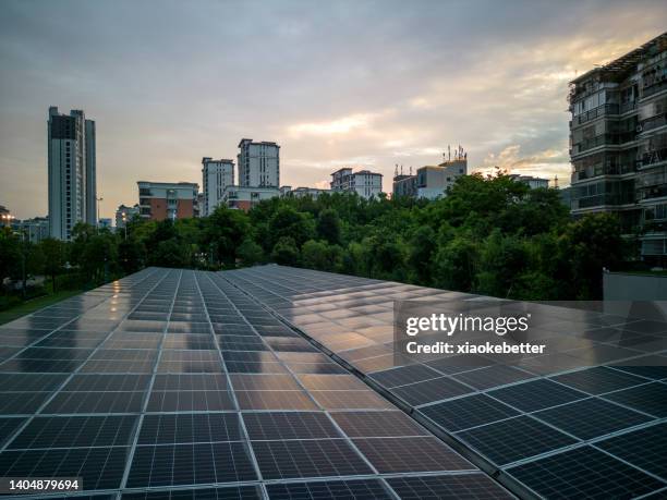 city solar panels - sustainable business stock pictures, royalty-free photos & images