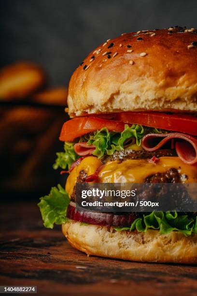 close-up of burger on serving board,turkey - giant cheeseburger stock pictures, royalty-free photos & images