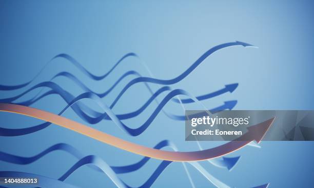 orange colored arrow standing out from the crowd - cycle concept stock pictures, royalty-free photos & images