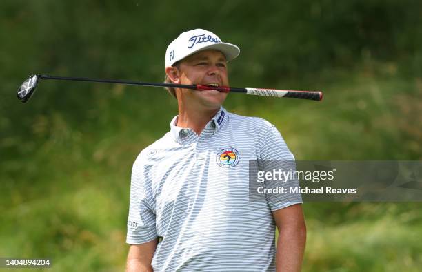 Patton Kizzire of the United States reacts to his tee shot on the 15th tee during the second round of Travelers Championship at TPC River Highlands...