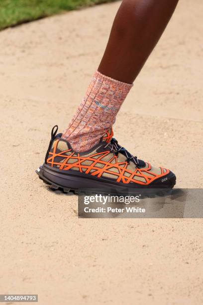 Model, shoe detail, walks the runway during the Dior Homme Menswear Spring Summer 2023 show as part of Paris Fashion Week on June 24, 2022 in Paris,...