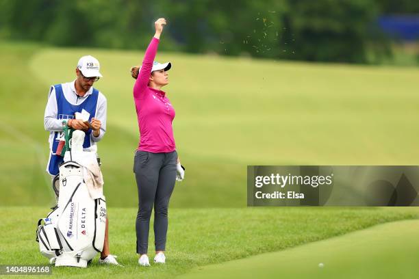 Gaby Lopez of Mexico checks the wind on the ninth fairway alongside her caddie during the second round of the KPMG Women's PGA Championship at...