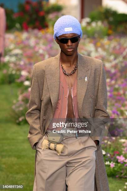 Model walks the runway during the Dior Homme Menswear Spring Summer 2023 show as part of Paris Fashion Week on June 24, 2022 in Paris, France.