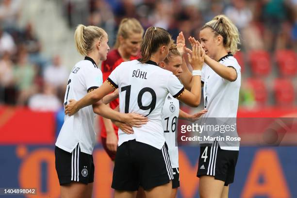 Klara Buehl of Germany celebrates scoring their side's fourth goal with teammates during the Women's International friendly match between Germany and...