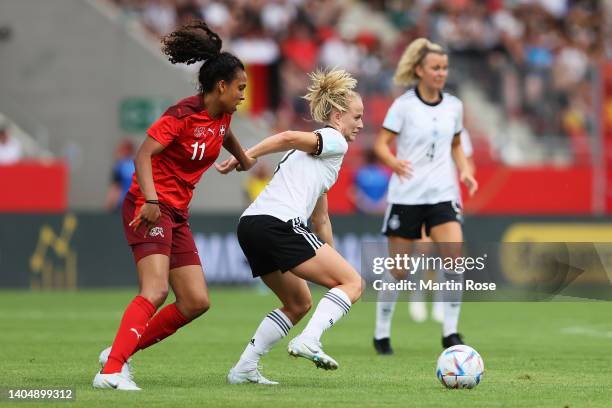 Coumba Sow of Switzerland challenges Lea Schueller of Germany during the Women's International friendly match between Germany and Switzerland at...