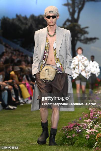 Model walks the runway during the Dior Homme Menswear Spring Summer 2023 show as part of Paris Fashion Week on June 24, 2022 in Paris, France.