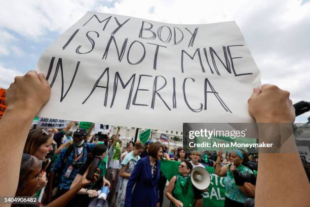 Abortion-rights activist react after the announcement to the Dobbs v Jackson Women's Health Organization ruling in front of the U.S. Supreme Court on...