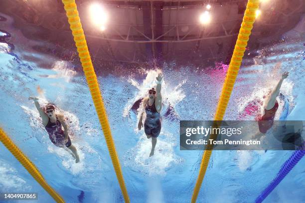 Leah Smith of Team United States, Katie Ledecky of Team United States and Bingjie Li of Team China compete in the Women's 800m Freestyle Final on day...