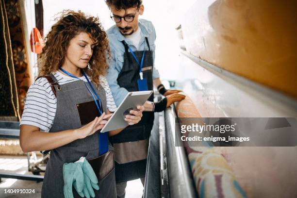 workers - textile machine stock pictures, royalty-free photos & images
