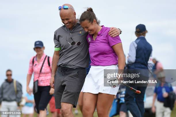 Jessica Baker of Gosforth Park Ladies celebrates with her caddie, her dad, after winning the semi-final match between Hannah Darling of Broomieknowe...