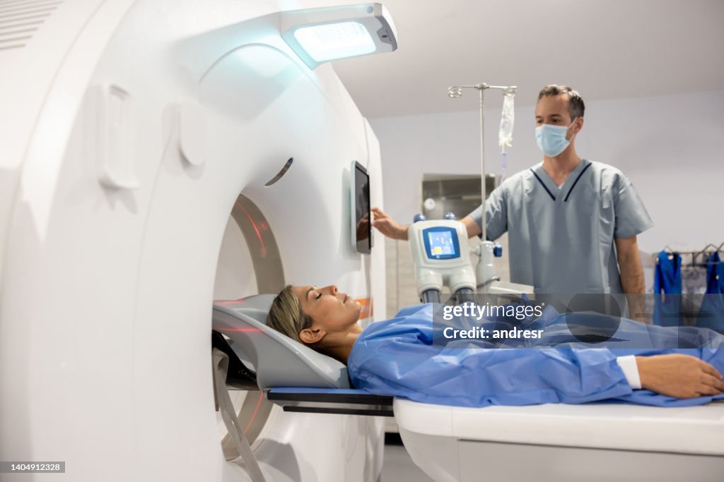 Getting Mri Scan Woman Getting An Mri Scan At The Hospital High-Res Stock Photo - Getty ...