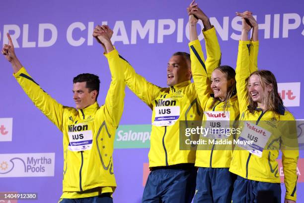 Gold medallists Jack Cartwright, Kyle Chalmers, Madison Wilson and Mollie O'Callaghan of Team Australia pose for a photo during the medal ceremony...