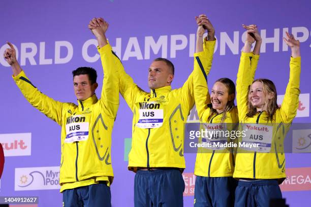 Gold medallists Jack Cartwright, Kyle Chalmers, Madison Wilson and Mollie O'Callaghan of Team Australia pose for a photo during the medal ceremony...