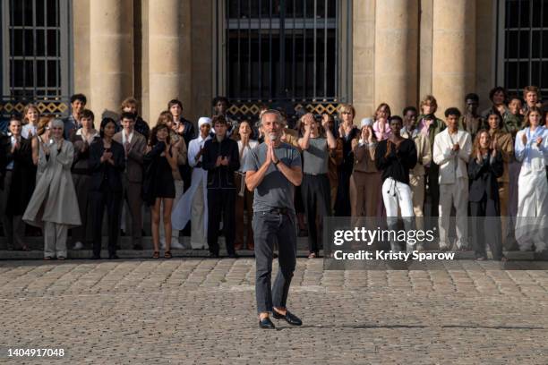Designer Pierre Mahéo acknowledges the audience during the Officine Generale Menswear Spring Summer 2023 show as part of Paris Fashion Week on June...