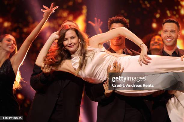 Host Katrin Bauerfeind performs on stage during the 72nd Lola - German Film Award show at Palais am Funkturm on June 24, 2022 in Berlin, Germany.