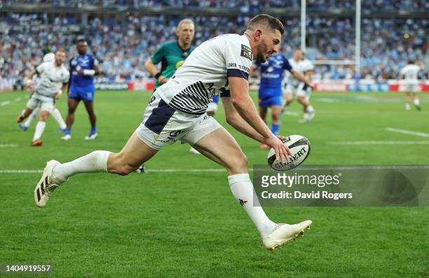 Anthony Bouthier of Montpellier scores their side's third try during the Final Top 14 match between Castres Olympique and Montpellier Herault Rugby...