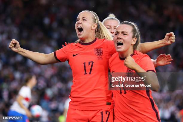 Beth Mead of England celebrates scoring their side's second goal with teammates Lauren Hemp during the Women's International friendly match between...
