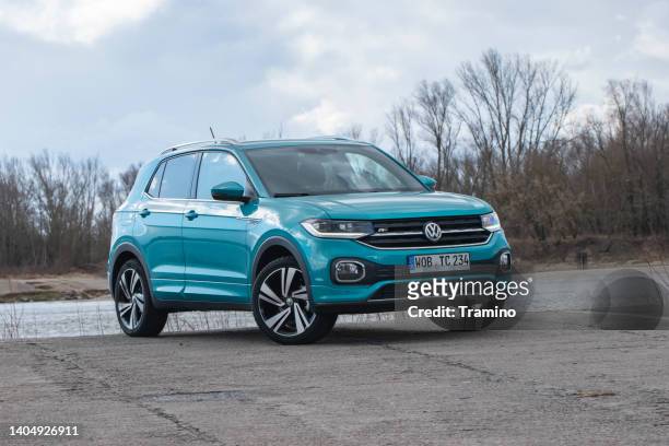 volkswagen t-cross next to the river - vw stock pictures, royalty-free photos & images