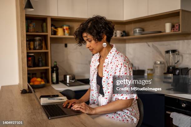 woman working from home - effortless stock pictures, royalty-free photos & images