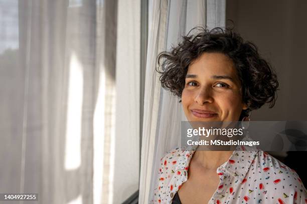 portrait of beautiful hispanic woman - 35 39 years stock pictures, royalty-free photos & images