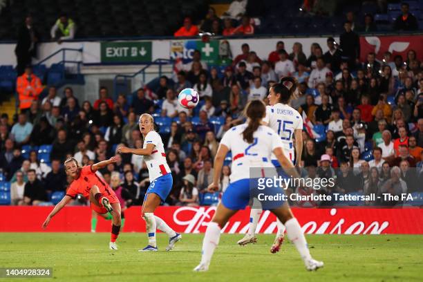 Ella Toone of England scores their side's third goal whilst under pressure from Lynn Wilms of Netherlands during the Women's International friendly...