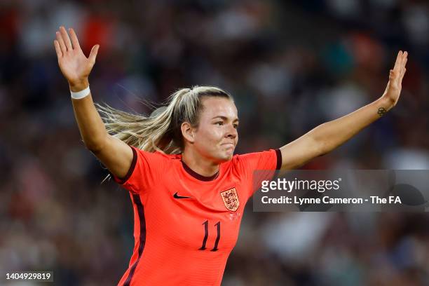 Lauren Hemp of England celebrates scoring their side's fourth goal with teammates during the Women's International friendly match between England and...