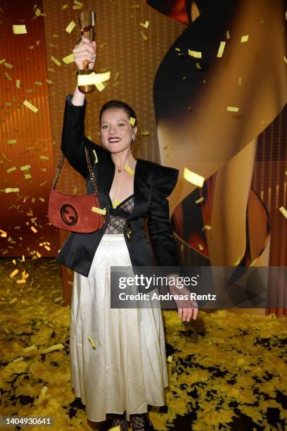 Jella Haase poses with her award during the 72nd Lola - German Film Award show at Palais am Funkturm on June 24, 2022 in Berlin, Germany.