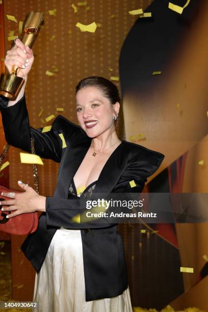 Jella Haase poses with her award during the 72nd Lola - German Film Award show at Palais am Funkturm on June 24, 2022 in Berlin, Germany.