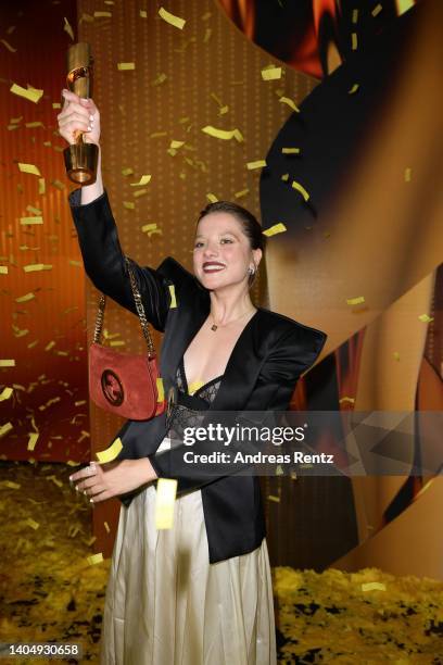 Jella Haase poses with her award during the 72nd Lola - German Film Award show at Palais am Funkturm on June 24, 2022 in Berlin, Germany.