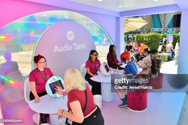 Creators, fans and attendees have their “Audio Tarot Cards” read at an immersive Spotify booth during VidCon 2022 at Anaheim Convention Center on...