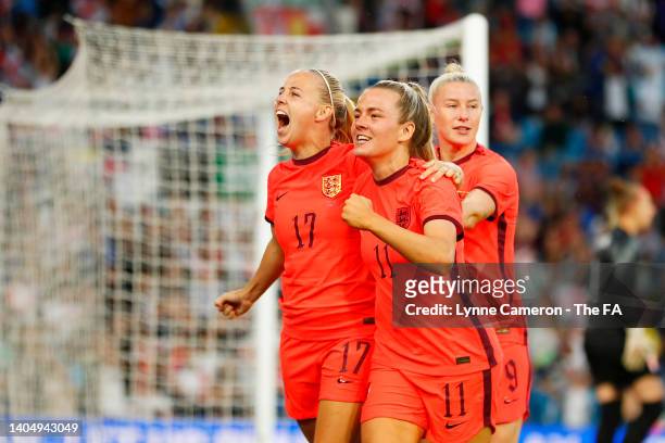 Beth Mead of England celebrates scoring their side's second goal with teammates Lauren Hemp and Bethany England during the Women's International...