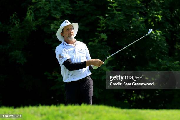 Stuart Appleby of Australia plays a shot on the ninth hole during the second round of the U.S. Senior Open Championship at Saucon Valley Country Club...