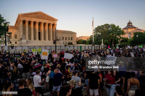 People protest in front of the U.S. Supreme Court in response to the Dobbs v Jackson Women's Health Organization ruling on June 24, 2022 in...